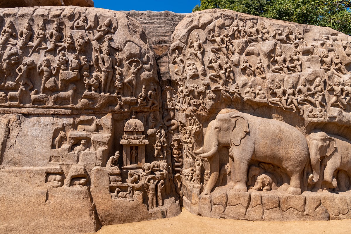 Arjuna’s Penance is an open-air rock relief is carved on two boulders of pink granite